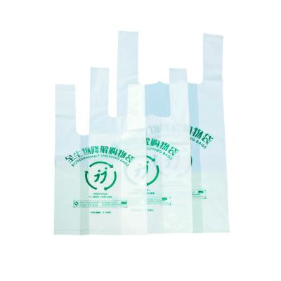 China Full Biodegradable Disposable Biodegradable Shopping Bag Eco Grocery Bags T-shirt Plastic Bag With Handles for sale