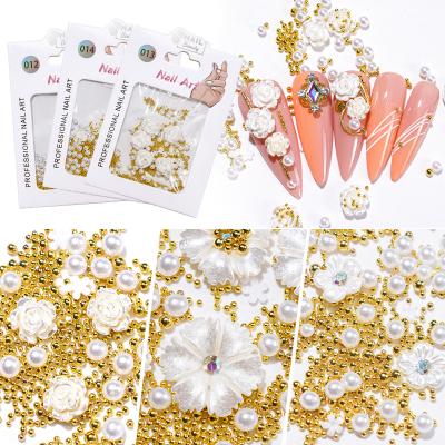 China 3D Nail Art DIY Decoration 2021 Hot Sale Nail Art Stereoscopic Resin Rose Small White Flower Nail Art Mixed-design 3D Rhinestone Decorations For DIY for sale