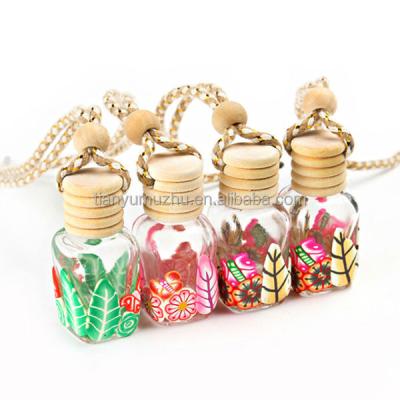 China Ceramic Hanging Design 8ML Air Bottle Car Fresher Half Perfume Empty Glass Bottle For Car Air Freshener for sale