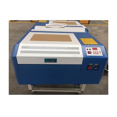 China Laser Engraving 2021 Engraving And Laser Cutting Machine With 4040 60w For Nonmetal Material for sale