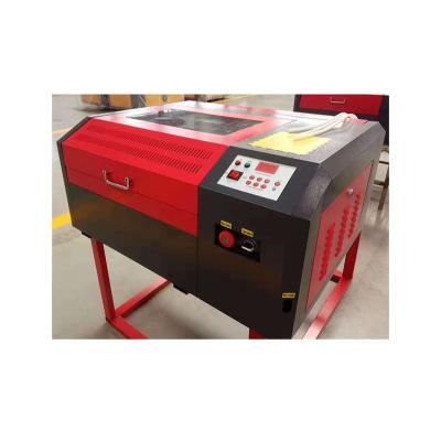 China Laser Engraving CO2 50w Laser Engraving Cutting Machine /small laser engraving machine /laser cutting engraving machine for sale