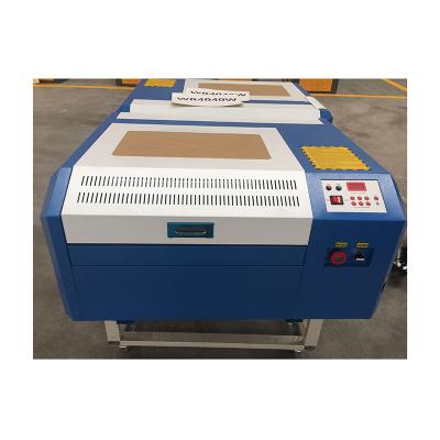 China Laser Engraving CO2 Fabric Laser Cutter And High Speed ​​Engraving Machine 50w Laser Cutting Machine Price for sale