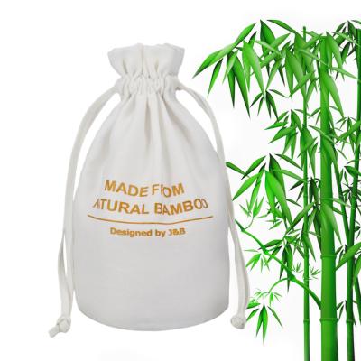 China Custom Printed Logo Natural Bamboo String Packaging Bag Preppy Style Bamboo Fiber Drawstring Pouch Bag For Makeup Cosmetic for sale