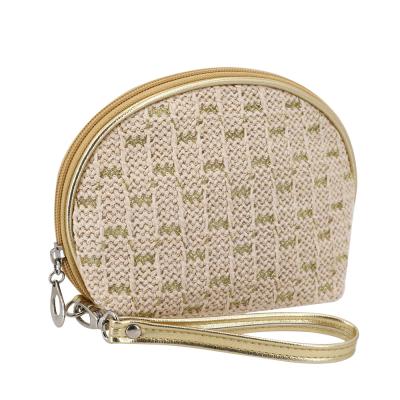 China Fashion Straw Make Up Toiletry Bag Custom Made With Removable Hand Strap For Women Portable Straw Beauty Pouch Bag Supplier for sale