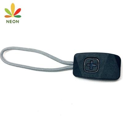 China Custom Embossed Rubber Design Logo Zipper Puller Nickel Free Embossed Puller for sale