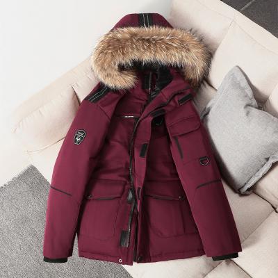 China QUICK DRY jacket down the same style men and women couples raccoon fur collar pocket fleece lined parka tooling winter thickened coa for sale