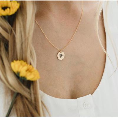 China FASHIONABLE eManco monthly flower engraved round pendant necklace for women girls factory low price for sale