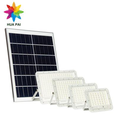 China Newest IP65 HUAPAI Garden Light Control 60w 100w 150w 200w Aluminum Remote Outdoor Solar LED Flood Light for sale