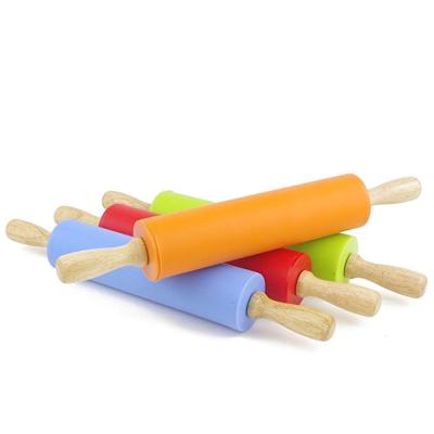 China Sustainable Non-Stick Silicone Pin With Wooden Handle Holder Dough Roller Tools for sale