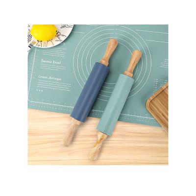 China Viable Non-Stick Silicone Rolling Pin Wooden Handle Pastry Dough Flour Roller Kitchen Baking Tool For Pasta Cookie Dough for sale