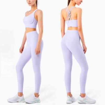 China Breathable Comfortable Ladies Yoga Recycled Sports Bra Clothing Set Gym Seamless Leggings Ribbed Yoga Set for sale