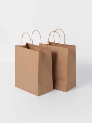 China Twisted Handle Brown Paper Bags Brown Kraft Shopping Bags Lightweight for sale