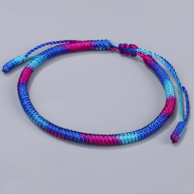 China 2021 New Style Luck Knot Tibetan Buddhist Love Luck Bracelet Ethnic Handmade Adjustable Rope Bracelet for sale