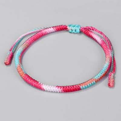 China Adjustable Braided Rope Lucky Bracelet Ethnic Handmade Tibetan Buddhist Fortune Macrame Knots Gradient Color Bracelet for sale