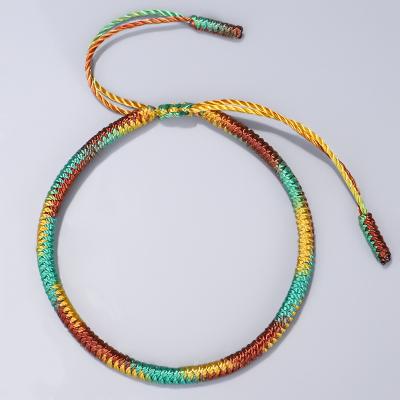 China Adjustable Braided Rope Lucky Ethnic Handmade Tibetan Buddhist Bangle Knots Gradient Color Bracelet for sale