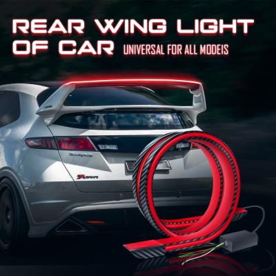 China Universal Car Soft Rear Lip Warning Light HAIZG LED Bumper Spoiler With Carbon Fiber Car Strip Light Decorative Light 120-130cm for sale