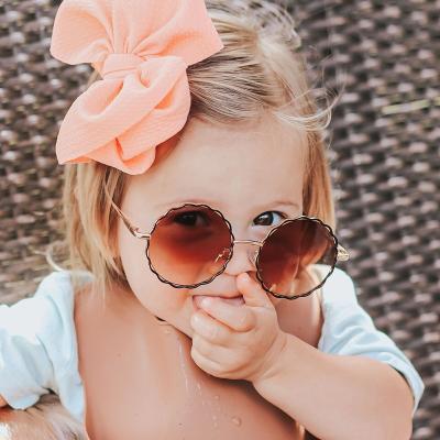 China Trendy Fashion Sun Glasses Kids UV400 Sunglasses Around Shaped Plastic Sun Glass Kids Sunglasses In Single Color for sale