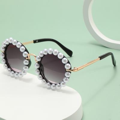 China Fashion Sunglasses Shape Newest Handmade Pearl Sunglasses Round Eye Shades Glass Children Creative Round Sunglasses for sale