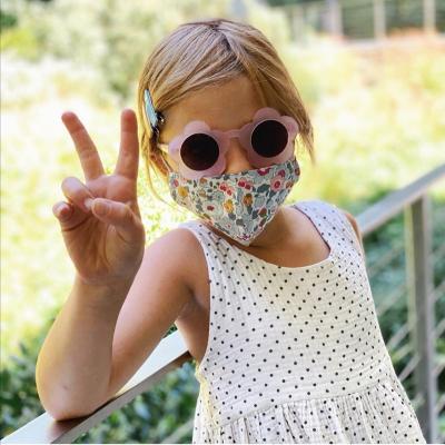 China Fashion Sunglasses Shape Sunflower UV400 Shaped Sun Glass Frame Plastic Kids Sunglasses For Girls for sale