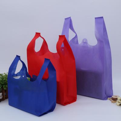 China Handled Reusable Non Woven W-Cut T-shirt Bag For Supermarket for sale