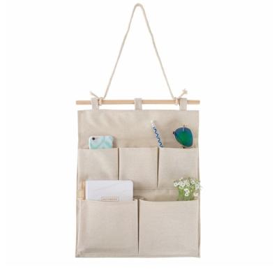 China Yulin Jiafu Baby Room Organizer Pocket Wall Hanging Canvas Viable Pocket Organizer for sale