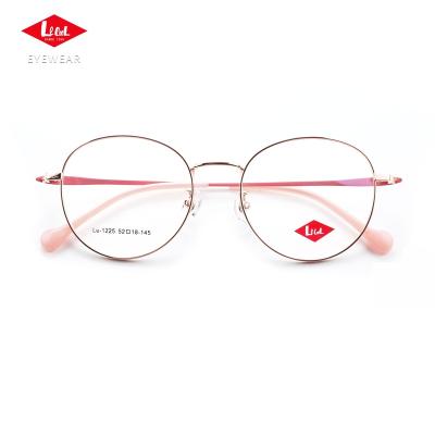 China Retro Eyewear Luxurious High Quality Fashionable Frame Designs Metal Reading Glasses Optical Frame Glasses for sale