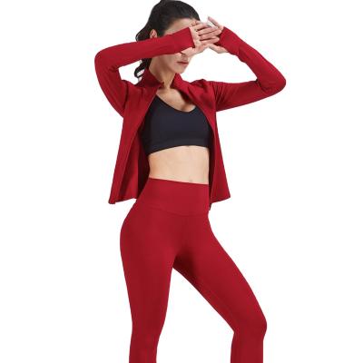 China Breathable Yoga wear women's fall/winter high-end fashion professional skinny long sleeve gym running suit for sale