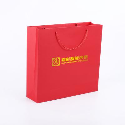 China Euro Ribbon Handle Boutique Shopping Recyclable Luxury Packaging Customized Printed Kraft Paper Gift Bags With Logo for sale