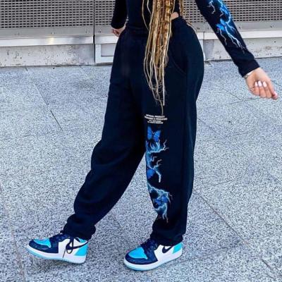 China 2021 New Autumn Girls Clothes Fashion Sports Pants Lightning Butterfly Letter Print Breathable Loose Waist Long Track Pants Women for sale