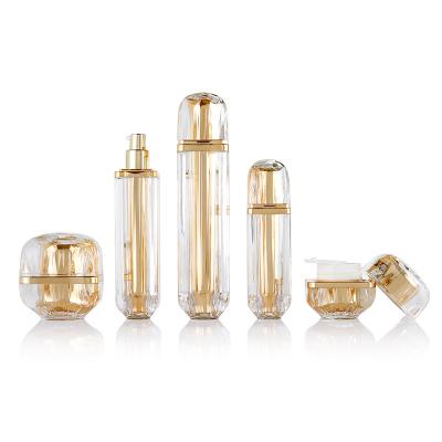 China Gold Custom Logo 30g 50g 30ml 50ml 100ml Recycable Cosmetic Bottle And Jar Diamond Skin Care Package Container Set for sale