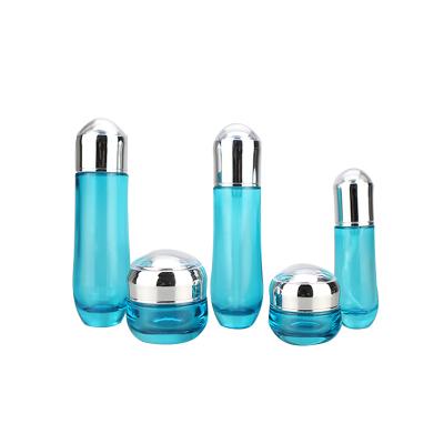 China New Type Cosmetic Clear Blue Glass Bottle And Cosmetic Jar 30g 50g 40ml 100ml 120ml Container Package For Personal Care Production for sale