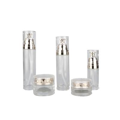 China New type skin care cream clear glass bottle and jar 30g 50g 40ml 80ml 100ml 120ml with silver round pump container cosmetic package for sale