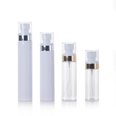 China Custom White Clear Fine Bottle Package Logo 60ml 80ml 100ml Mist Spray PET Bottle With Gold And Silver Line Cosmetic Cap Package Container for sale