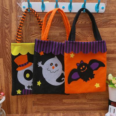 China Reusable Wholesale Pumpkin Festival Decorations Props Gift Nonwoven Ghost Tote Bag Candy Bag for sale