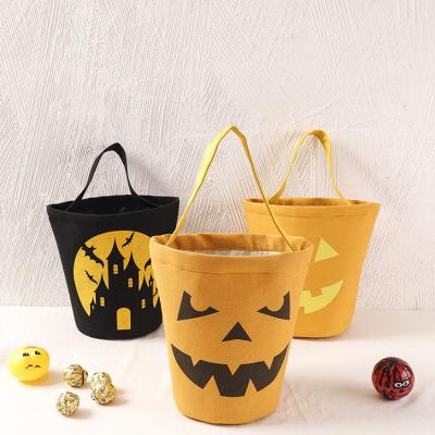 China New Design Halloween Reusable Portable Canvas Candy Bucket Cotton Basket Orange Pumpkin Gift Bag for sale