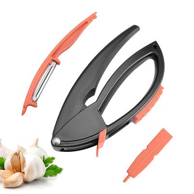 China Viable Multifunctional Garlic Press Fruit Peeler Mash Home Paster Manual Garlic Blender Kitchen Tool for sale