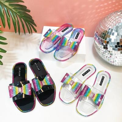 China BUSY GIRL AL5096 New arrivals 2021 transparent diamond bow slippers jelly women's slippers for sale