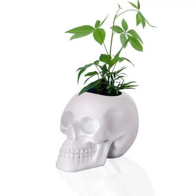 China New Europe Collection Art Decoration Centerpiece Flower Skull Resin Vase for sale