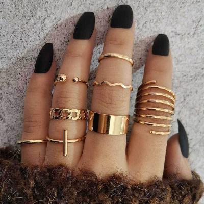 China High Quality 8 Pcs/Set Single Spring Cross Ring Double Ball Opening Hollow Wave Chain Link Set Fashion Design Simple Luminous Outer Jewelry for sale