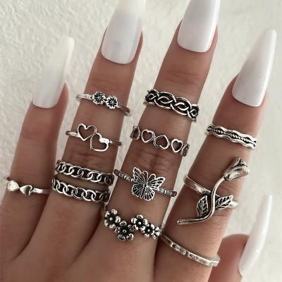 China 11 PCs High Quality Love Rose Ring Butterfly Flower Wave Pattern Hollow Line/Men Women Set Wrapping Ring Set Travel Accessories Souvenirs for sale