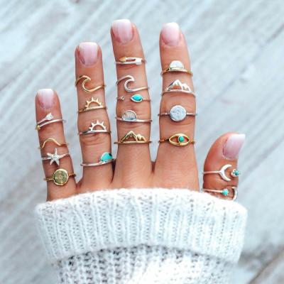 China High Quality 19 Pcs/Set Fashion European American Border Gold Silver Two Color Turquoise Sun Compass Arrow Multi Piece Ring for sale