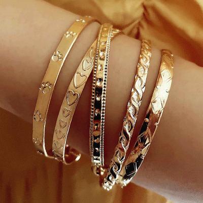 China High Quality 5 Pcs/European American Border Jewelry Animal Footprints Set Central Institute of Statistics Love Open Diamond Shaped Twist Bracelet Set Bracelet Set for sale