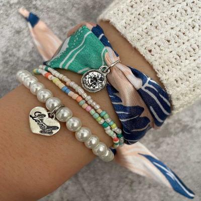 China High Quality 4 PCs/Set New European American Border Holiday Style Fabric Love Pearl Color Beaded Art Bohemian Bracelet Set for sale