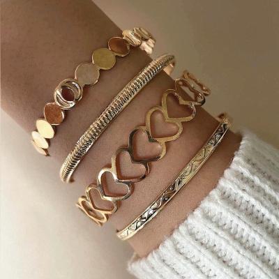 China High Quality 4 Pcs / Love European American Border Circle Set Statistical Jewelry Irregular Pattern Bracelet Set Multi Piece Stacking Jewelry for sale