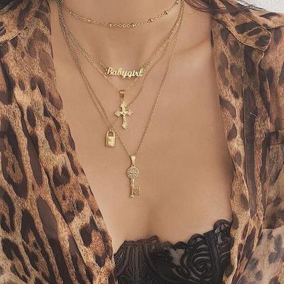 China High Quality 5 Pcs/Set Women Necklace Set Jesus Cross Necklace Multilayered Lady Retro Temperament Beach English Letter Key Lock Pendant Long for sale