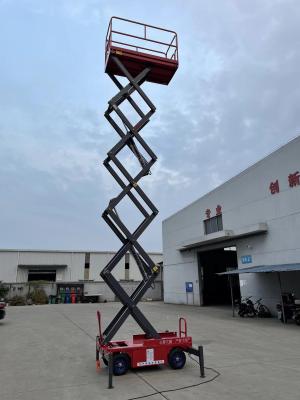 China High Capacity 320kg Double Scissor Lift With 12m Reach Reliable And Safe Hydraulic Electric Aerial Platform for sale