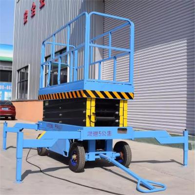 China 6m 8m 12m 230kg Geheven werkplatform Zelfrijdend schaar Lifttafel Doorvergrendelde deur op het platform Te koop