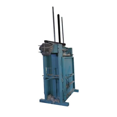 China fiber baler/waste paper baler electric vertical hydraulic baler machine for used fabric packing plastic cotton compress fiber baler machine for sale