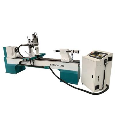 China WS-L1530-4S Wood Column Wood CNC Lathe Machine with 4 Axis Engraving Spindle for sale