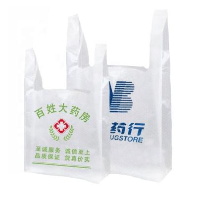 China Hot Selling Biodegradable Plastic Vest Shopping Bag Polythene Bag Custom Printing Biodegradable Vest Bag By Full Automatic Machine Making for sale